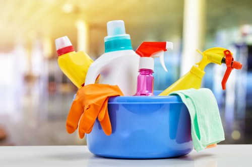 Cleaning team performing builders clean in NW1 in a modern kitchen and living area
