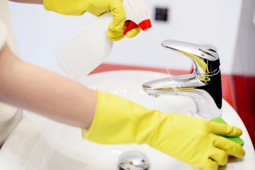 Local upholstery cleaning technician restoring fabric furniture in NW1