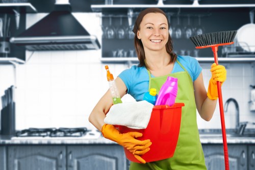 Worker applying carpet cleaning product with caution