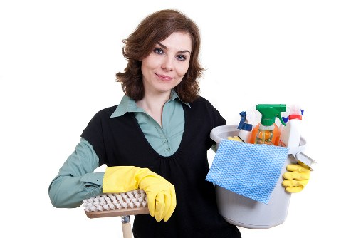 Professional carpet cleaning team following safety procedures